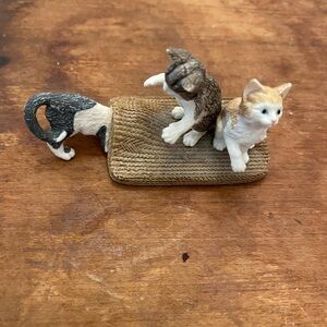 Adorable Pet Figurine Trio on Woven Mat